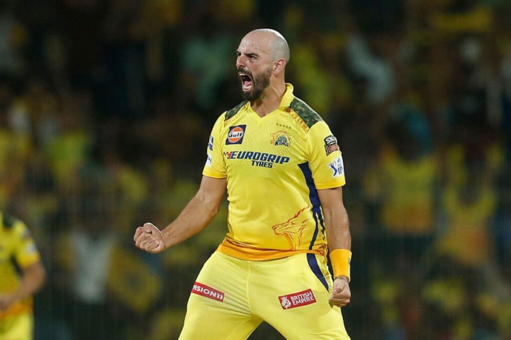 Daryl Mitchell Celebrates Dismissal of Batsman