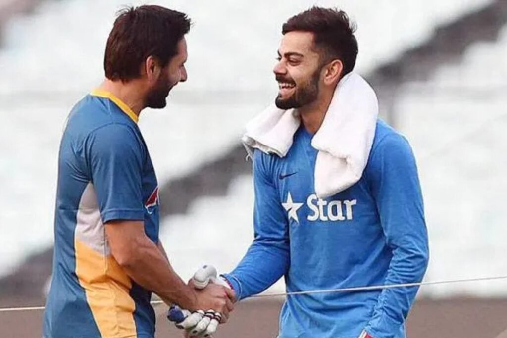 Virat Kohli with Shahid Afridi